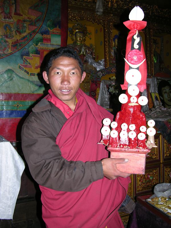 20 Rongbuk Monastery Monk Holding a Butter Sculpture